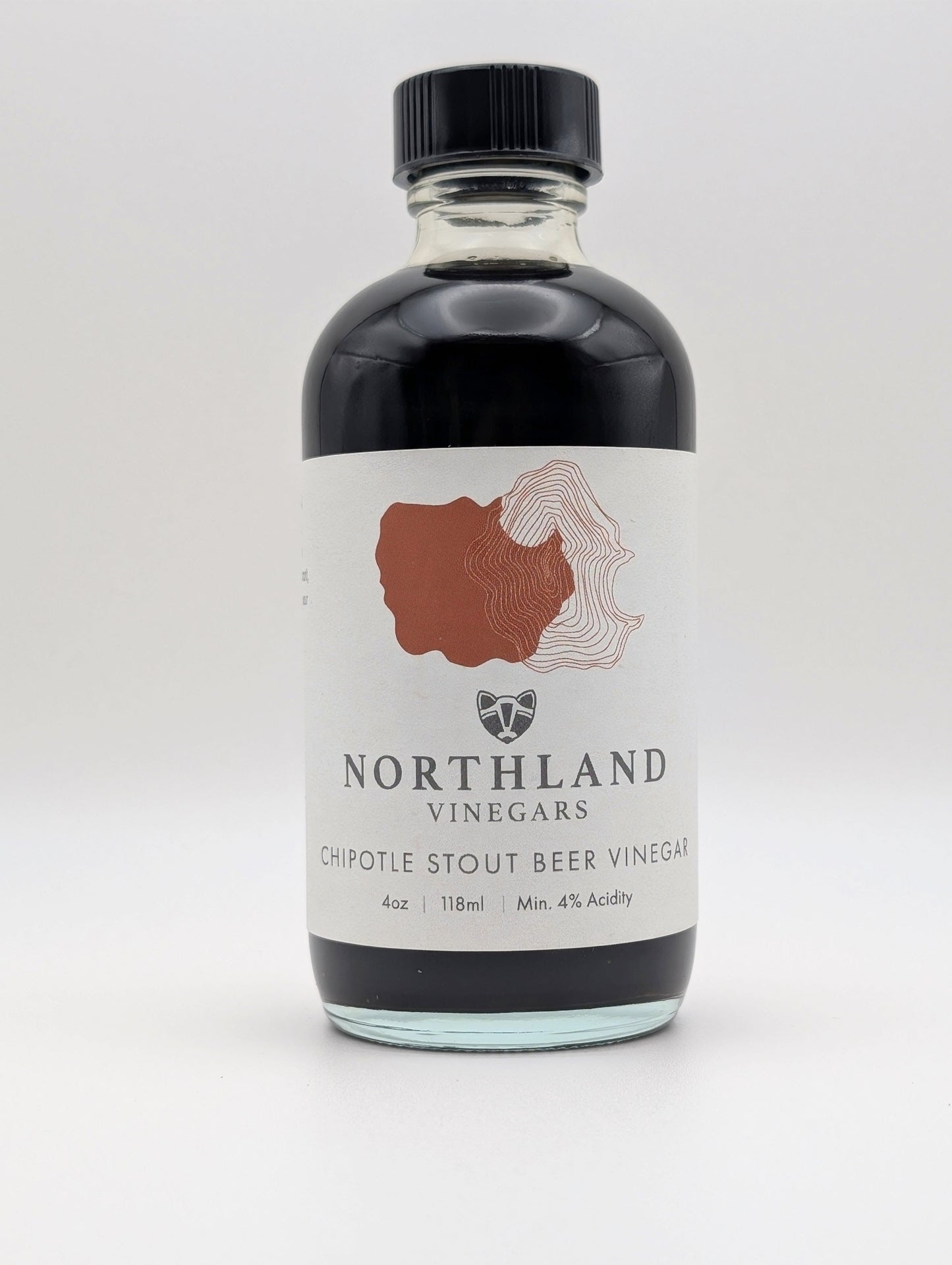 Bottle of Northland Vinegars Chipotle Stout Beer Vinegar on a white background