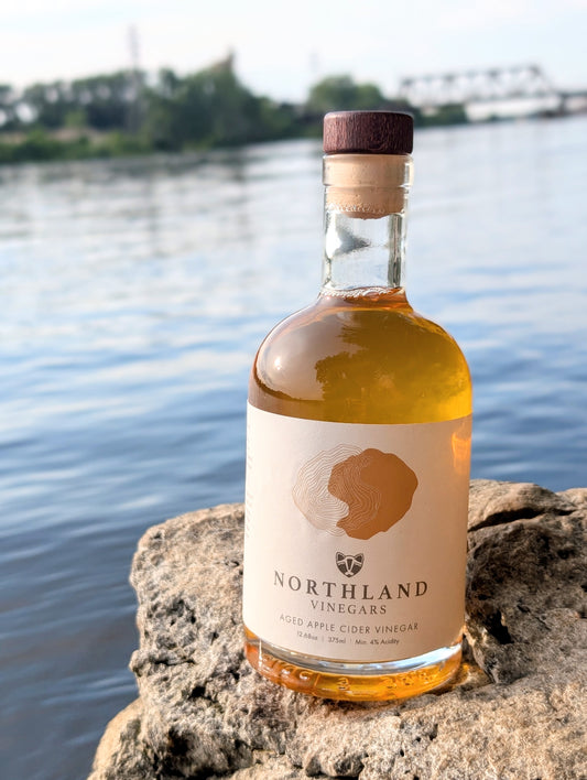 Small-batch Aged Apple Cider Vinegar made from Minnesota apples, naturally fermented and aged for depth of flavor